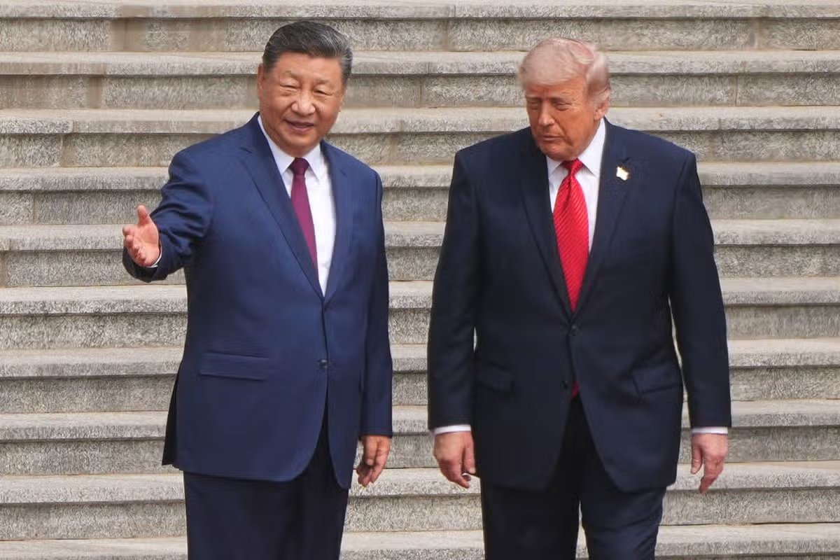El presidente Donald Trump asiste a la ceremonia de bienvenida con el presidente chino Xi Jinping 